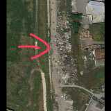 Focus sull'accampamento rom del canalone: le case di cartone e i rifiuti si vedono anche dal satellite di Google Maps